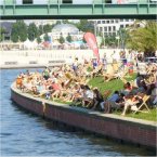 Sunbathing by the river